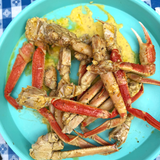 Hot boiled CRAB LEGS on the patio